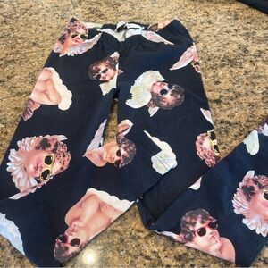 Joyrich Angel leggings in black cherub Cupid print